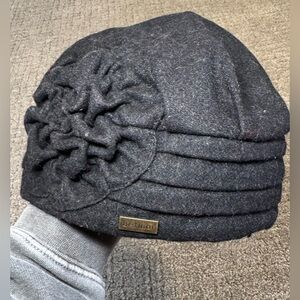 Betmar Alexandrite cloche black hat with floral accent